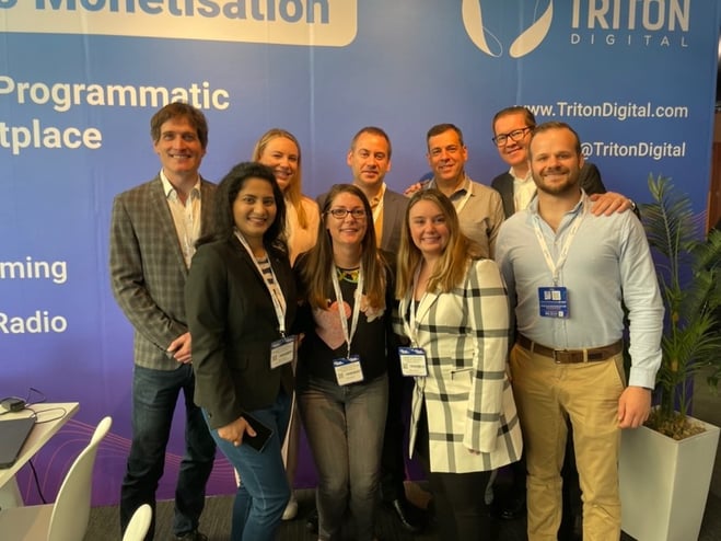 A group of people posing for a photo
Description automatically generated